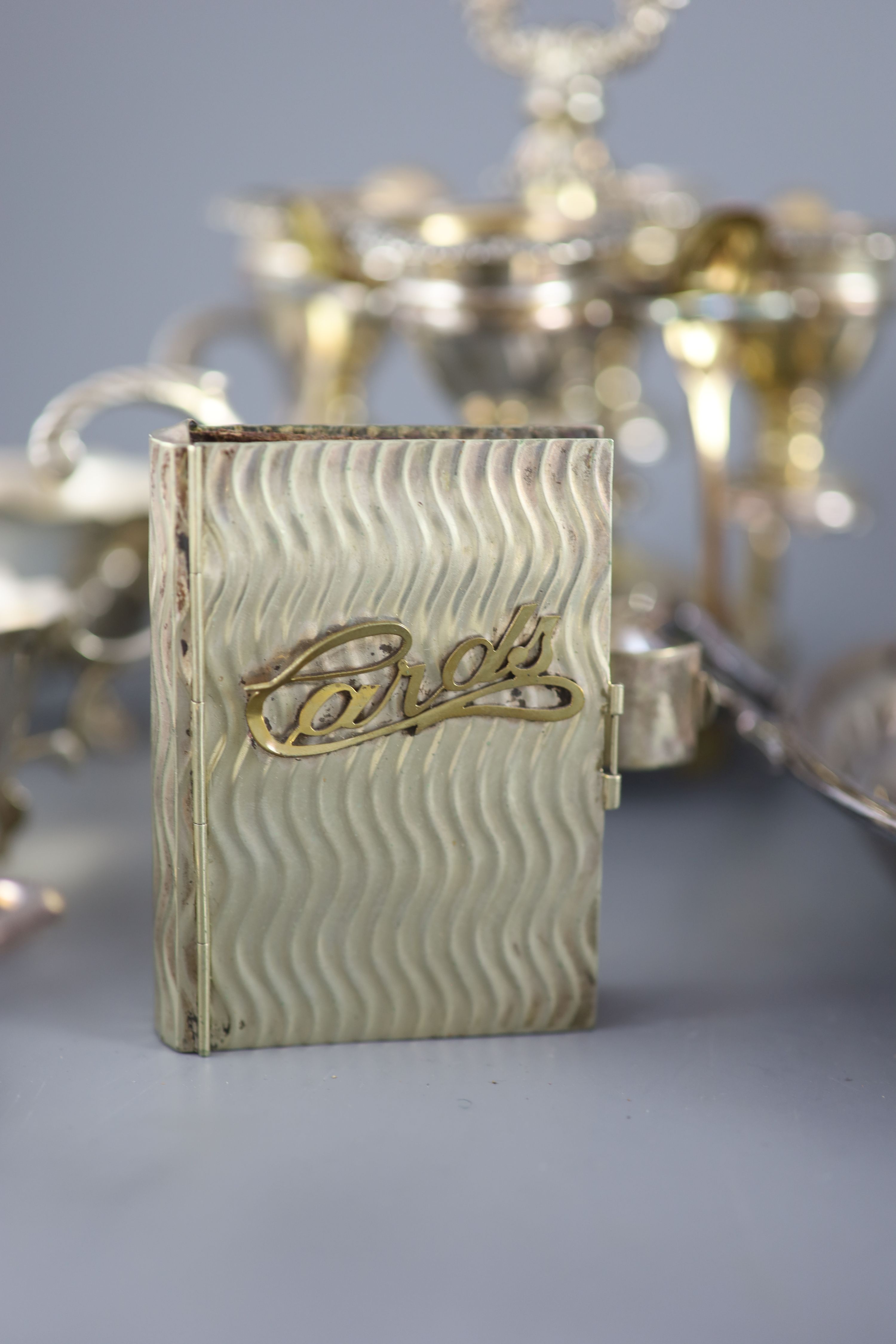 A silver plated egg cruet, a butter dish, a table salt and sundry other plated wares